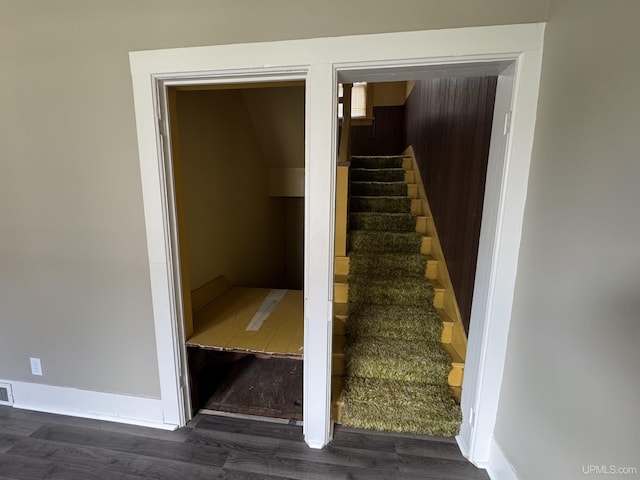 406 S 12th St, Escanaba, MI 49829 - stairway featuring wood finished floors and baseboards