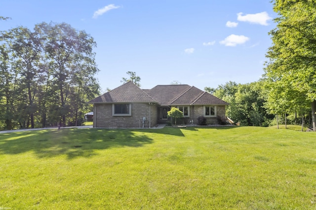 6767 Puttygut Rd, East China, MI 48054 - view of front of home with a front lawn and brick siding