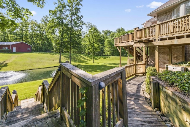 6767 Puttygut Rd, East China, MI 48054 - deck with stairway and a yard