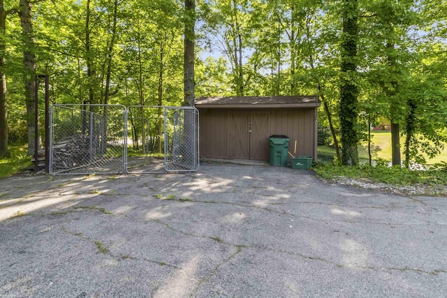 6767 Puttygut Rd, East China, MI 48054 - view of shed with a gate