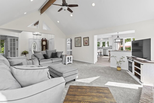 6767 Puttygut Rd, East China, MI 48054 - living area featuring light carpet, beamed ceiling, recessed lighting, a chandelier, and a ceiling fan