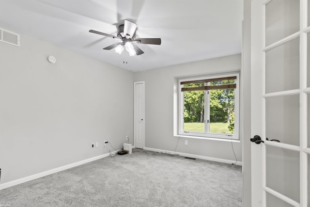 6767 Puttygut Rd, East China, MI 48054 - carpeted empty room with ceiling fan and a smoke detector