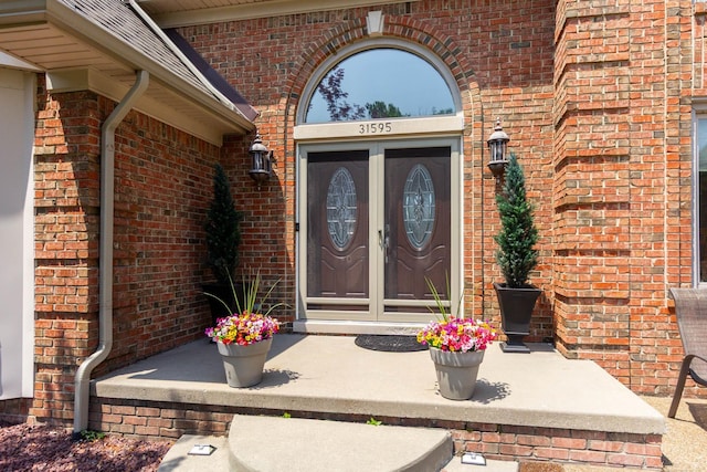 31595 N River Rd, Harrison Twp, MI 48045 - property entrance with french doors and brick siding