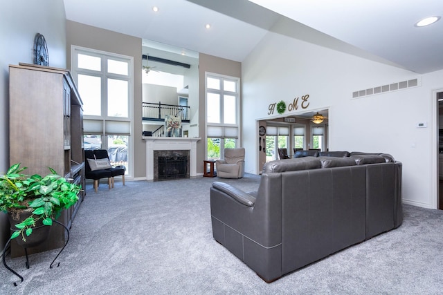 31595 N River Rd, Harrison Twp, MI 48045 - living area featuring high vaulted ceiling, carpet, a ceiling fan, a premium fireplace, and recessed lighting