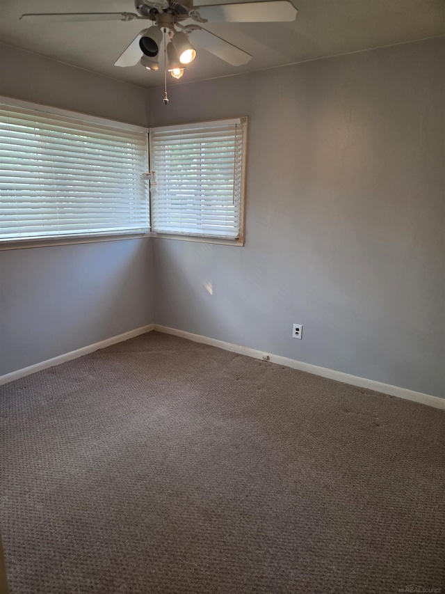 23018 Englehardt Cmn, Saint Clair Shores, MI 48080 - carpeted spare room with ceiling fan and baseboards