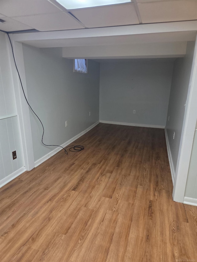 23018 Englehardt Cmn, Saint Clair Shores, MI 48080 - finished below grade area featuring light wood-style flooring and baseboards