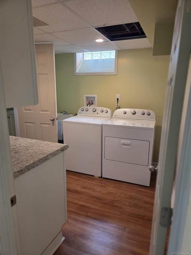 23018 Englehardt Cmn, Saint Clair Shores, MI 48080 - laundry area with washer and dryer and dark wood-style floors