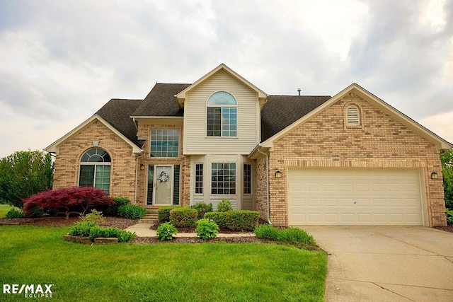 21832 Preserve Ct, Macomb Twp, MI 48042 - traditional-style house featuring brick siding, concrete driveway, a front yard, a garage, and roof with shingles