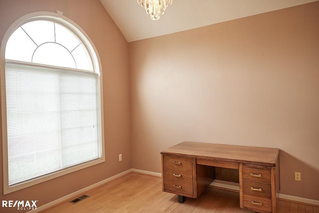 21832 Preserve Ct, Macomb Twp, MI 48042 - unfurnished office with light wood-type flooring, a chandelier, and vaulted ceiling