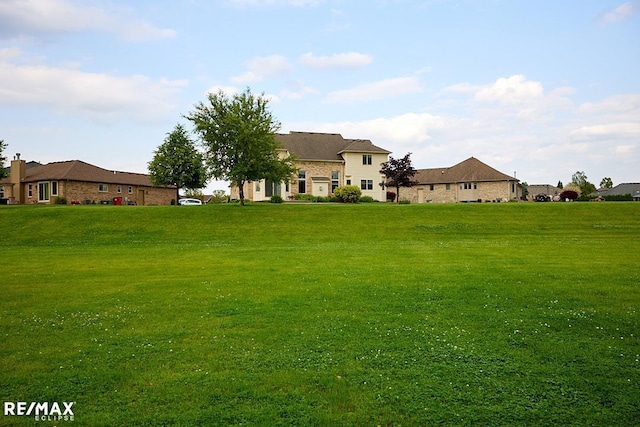 21832 Preserve Ct, Macomb Twp, MI 48042 - view of green lawn with a residential view