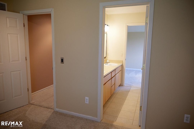 21832 Preserve Ct, Macomb Twp, MI 48042 - bathroom with vanity and baseboards