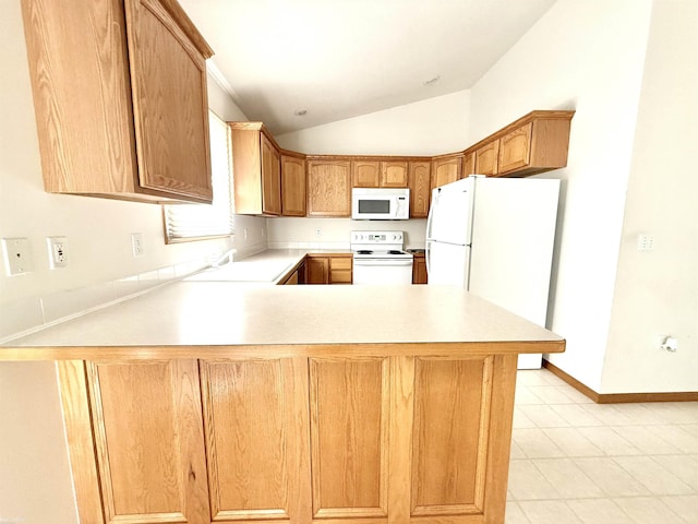 1248 S Hemlock Rd, Hemlock, MI 48626 - kitchen with white appliances, vaulted ceiling, a peninsula, light countertops, and light tile patterned floors
