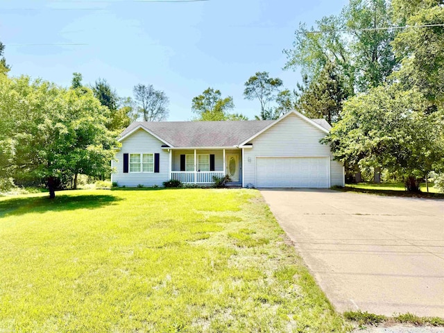 1248 S Hemlock Rd, Hemlock, MI 48626 - single story home featuring covered porch, a garage, a front lawn, and concrete driveway