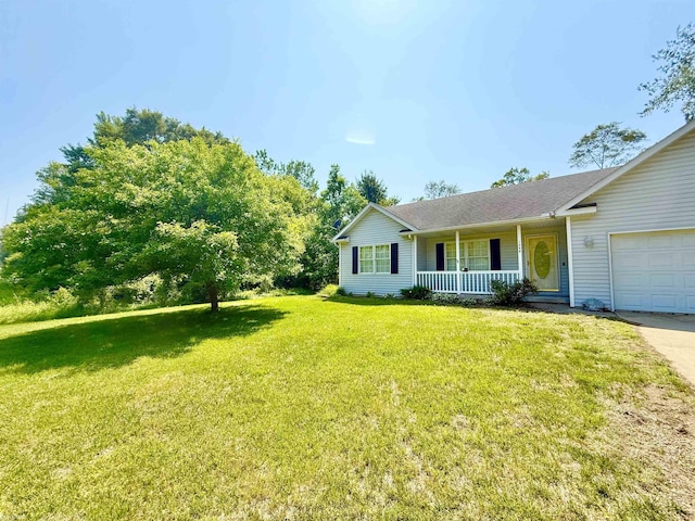 1248 S Hemlock Rd, Hemlock, MI 48626 - view of front of property with a porch, a garage, a front lawn, and driveway