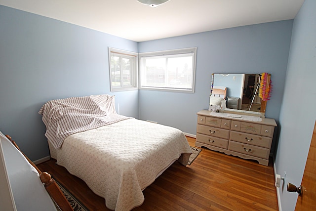 24849 Curie St, Warren, MI 48091 - bedroom with wood finished floors and baseboards