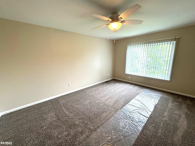 53168 Pineridge Dr, New Baltimore, MI 48051 - carpeted empty room featuring ceiling fan and baseboards