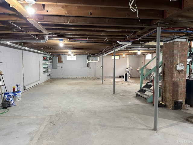 708 Paul Bunyan Ave, Ontonagon, MI 48853 - basement with electric panel and stairs