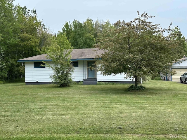 708 Paul Bunyan Ave, Ontonagon, MI 48853 - view of front of home featuring a front lawn and entry steps