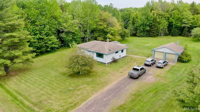 708 Paul Bunyan Ave, Ontonagon, MI 48853 - aerial view of property and surrounding area with a heavily wooded area