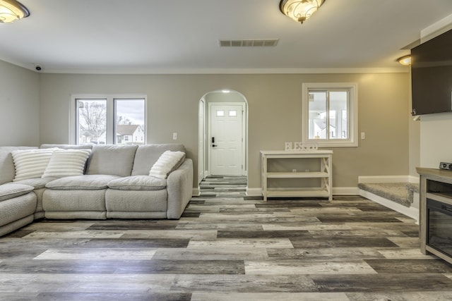 29230 Harding St, Roseville, MI 48066 - living room featuring arched walkways and wood finished floors