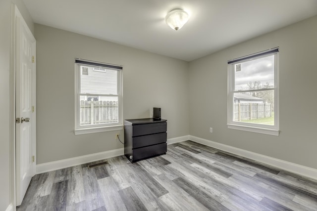 29230 Harding St, Roseville, MI 48066 - spare room featuring wood finished floors and baseboards