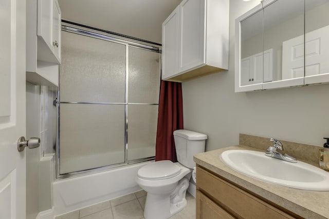 29230 Harding St, Roseville, MI 48066 - bathroom with combined bath / shower with glass door, vanity, and tile patterned floors