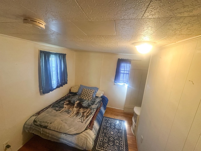 423 W Railway St, Coleman, MI 48618 - bedroom with wood finished floors