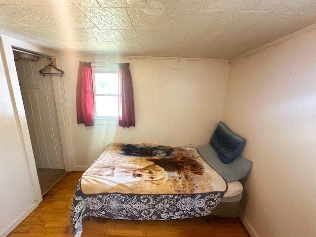 423 W Railway St, Coleman, MI 48618 - bedroom with wood finished floors