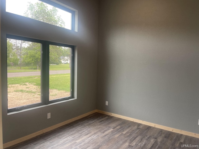 227 W Birch St, Ironwood, MI 49938 - unfurnished room featuring wood finished floors