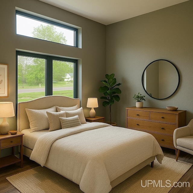 227 W Birch St, Ironwood, MI 49938 - bedroom featuring wood finished floors