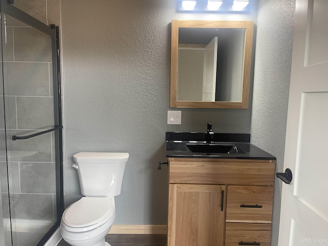 227 W Birch St, Ironwood, MI 49938 - full bath with vanity, a stall shower, and a textured wall