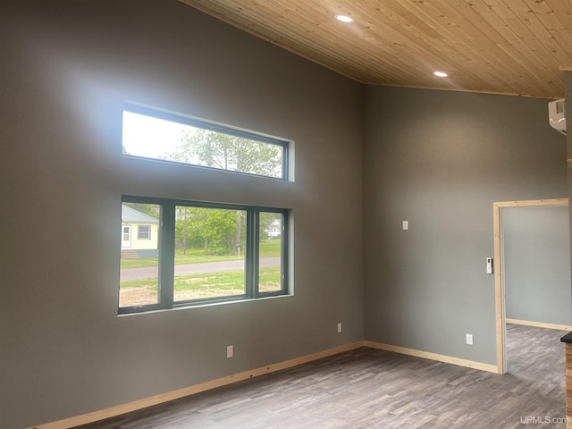 227 W Birch St, Ironwood, MI 49938 - empty room featuring wooden ceiling, recessed lighting, and wood finished floors