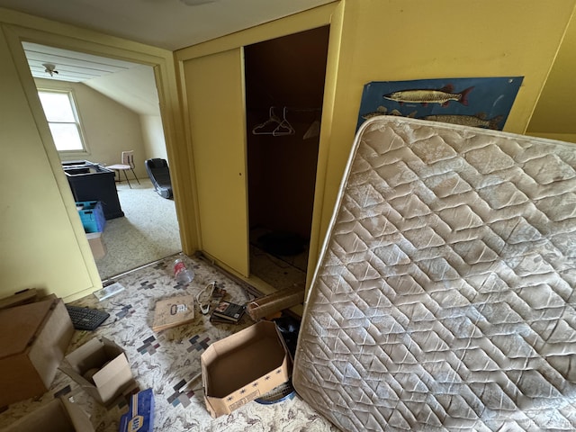 301 Kahma Ave, Amasa, MI 49902 - bedroom featuring a closet and lofted ceiling