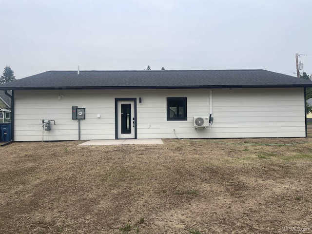 235 W Birch St, Ironwood, MI 49938 - rear view of house featuring a patio and a shingled roof