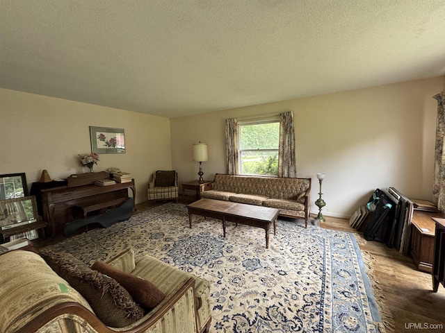 3 Fairway Dr, Marquette, MI 49855 - living area with a textured ceiling and light wood-type flooring