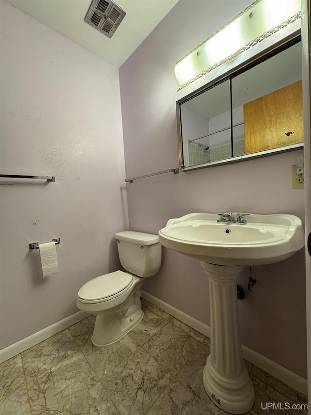 3 Fairway Dr, Marquette, MI 49855 - bathroom featuring baseboards and marble finish flooring