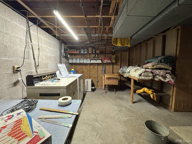 3 Fairway Dr, Marquette, MI 49855 - unfinished below grade area with washer and clothes dryer and concrete block wall