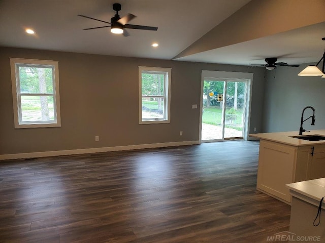 26593 Alray St, Chesterfield, MI 48051 - living room featuring plenty of natural light, a ceiling fan, lofted ceiling, dark wood-style flooring, and recessed lighting