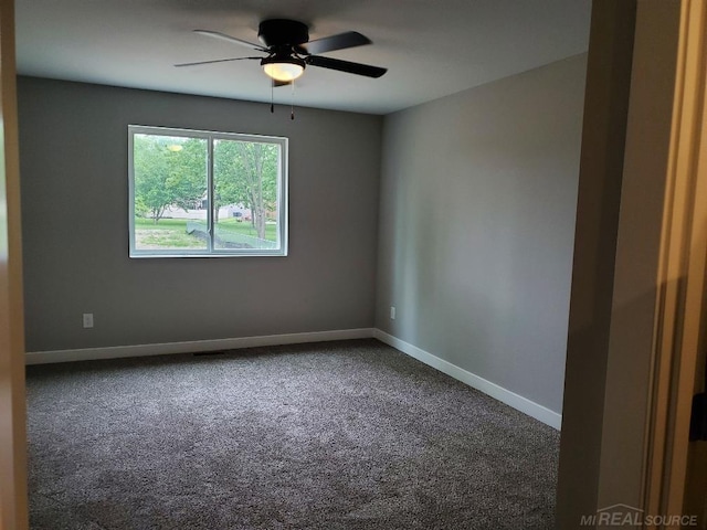 26593 Alray St, Chesterfield, MI 48051 - carpeted empty room featuring a ceiling fan and baseboards