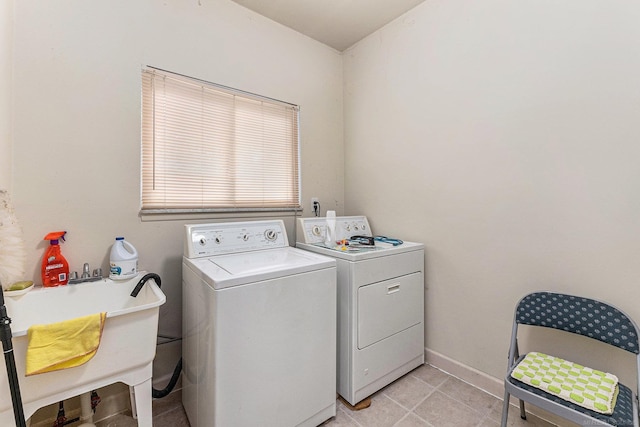 32615 Coventry Pl, Warren, MI 48093 - washroom with independent washer and dryer and light tile patterned floors