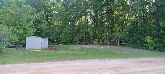 2145 Deer Lake Rd, Harrison, MI 48625 - view of yard with a storage shed