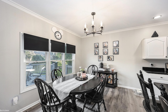 53564 Grace Dr, New Baltimore, MI 48047 - dining space with a chandelier, ornamental molding, and dark wood finished floors