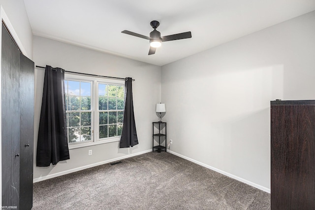 53564 Grace Dr, New Baltimore, MI 48047 - carpeted empty room with ceiling fan and baseboards