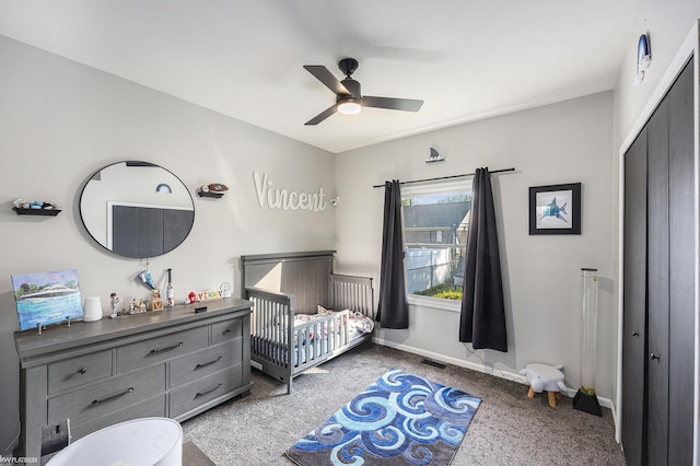 53564 Grace Dr, New Baltimore, MI 48047 - carpeted bedroom with a nursery area and a ceiling fan