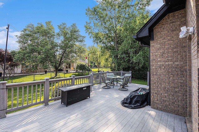 53564 Grace Dr, New Baltimore, MI 48047 - wooden deck featuring outdoor dining area