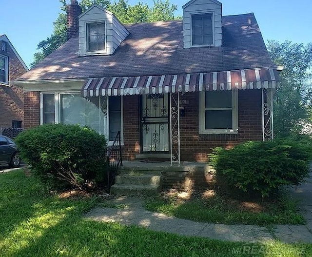20101 Biltmore St, Detroit, MI 48235 - view of front facade with a chimney and brick siding