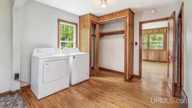N1953 M67 Hwy, Limestone, MI 49816 - laundry room featuring washer and dryer, light wood-type flooring, and plenty of natural light