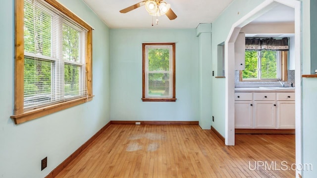 N1953 M67 Hwy, Limestone, MI 49816 - unfurnished room featuring light wood-type flooring and ceiling fan