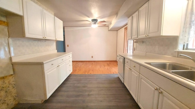 9470 Arbela Rd, Millington, MI 48746 - kitchen with ceiling fan, wood finished floors, light countertops, white cabinetry, and tasteful backsplash