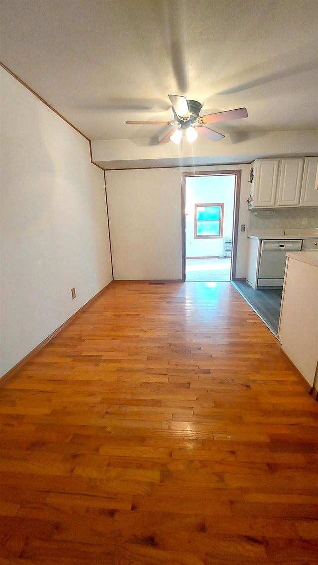 9470 Arbela Rd, Millington, MI 48746 - spare room featuring ceiling fan and light wood finished floors